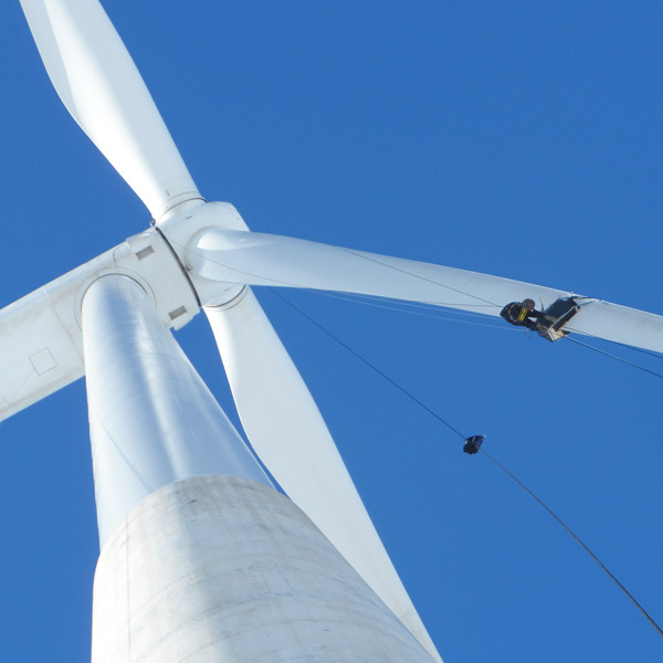 Wind turbine and the repairman.